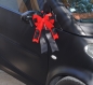 Mobile Preview: Große Schleife rot mit schwarz, Bindeband und Klebepad