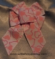 Mobile Preview: Klein, fein, dezent, adrett, schicke Schleife mit rosa Herzchen